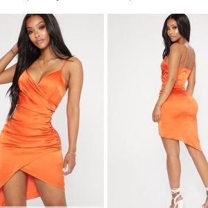 Orange satin wrap dress